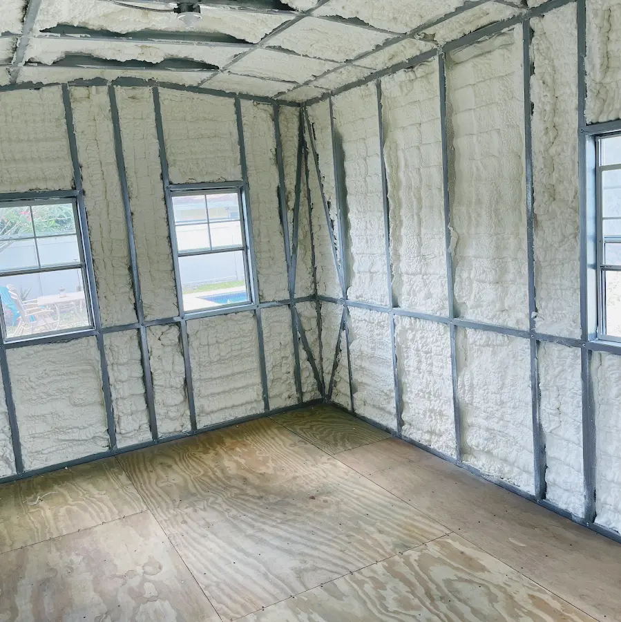 Closed-cell spray foam insulation applied to wall cavities in a residential project in Eastman