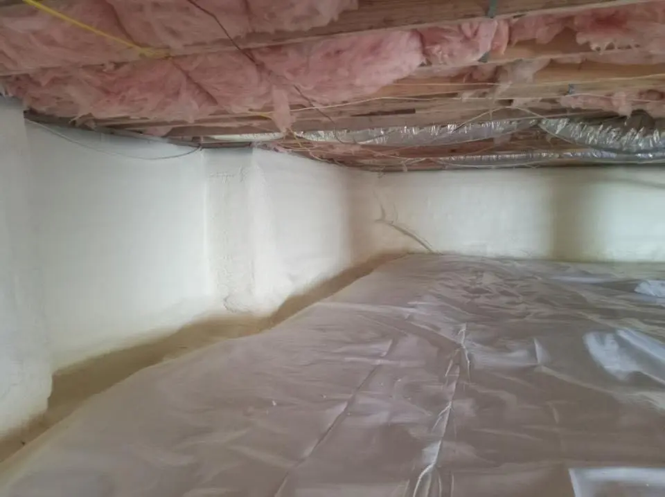 Crawl space encapsulation with closed-cell spray foam for Roof Waterproofing in Eastman